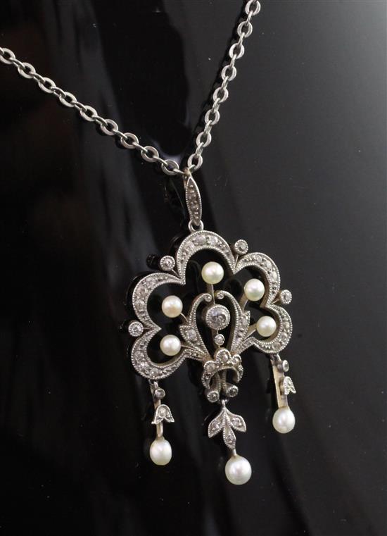 An early 20th century Belle Epoque gold, diamond and pearl drop pendant, pendant 1.75in.